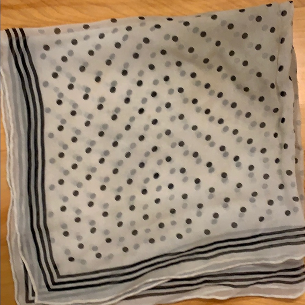 Black and cream polka dotted scarf.